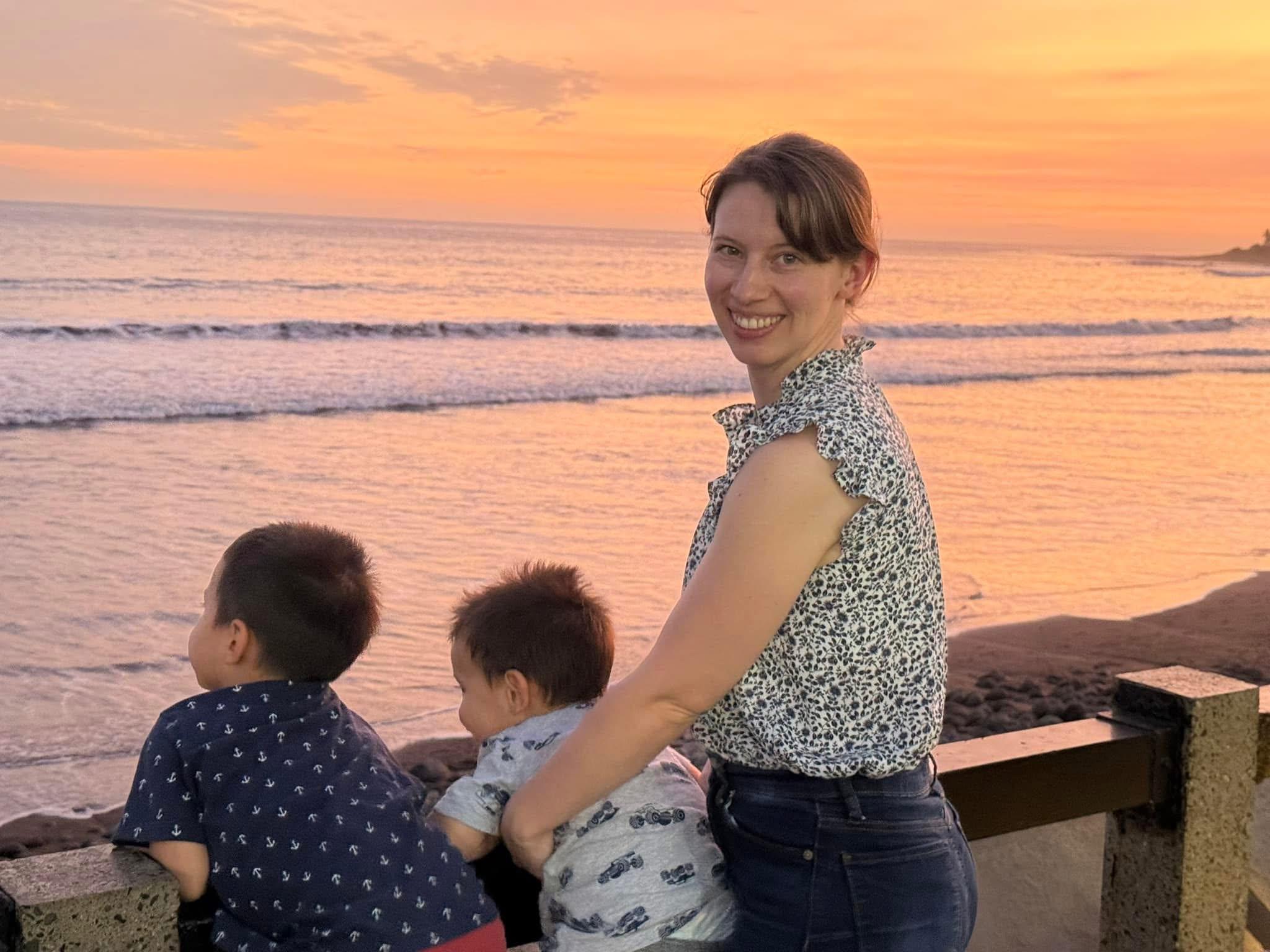 Ariana with her two boys at an El Salvador beach sunset