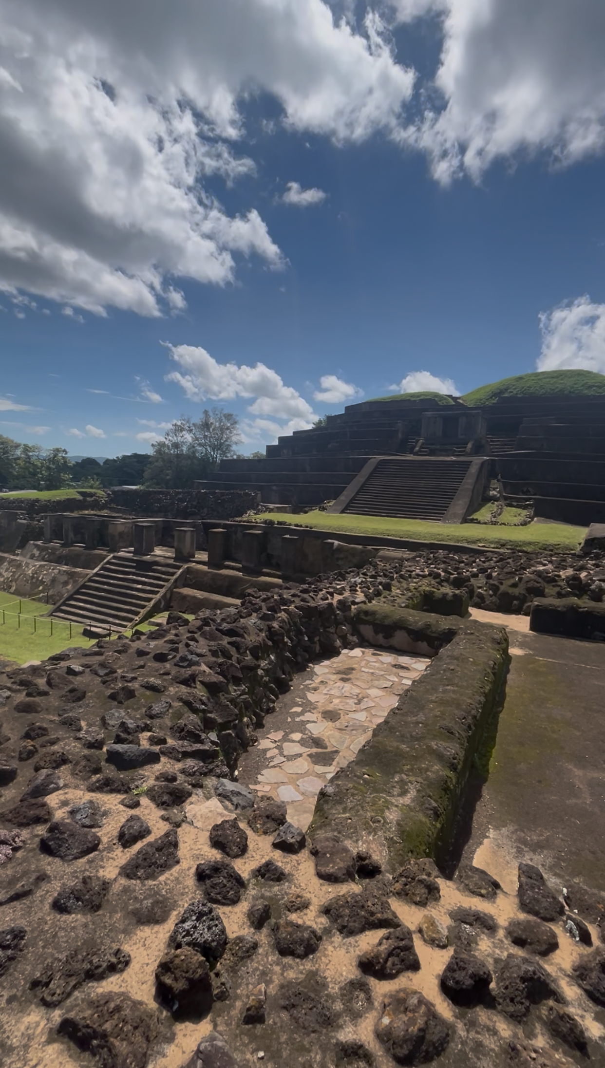 Climbing the designated section of the ancient Mayan structure at Tazumal with kids