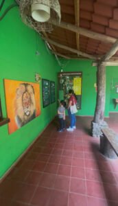 Family looking at the map sign at the FURESA El Salvador entrance in Jayaque